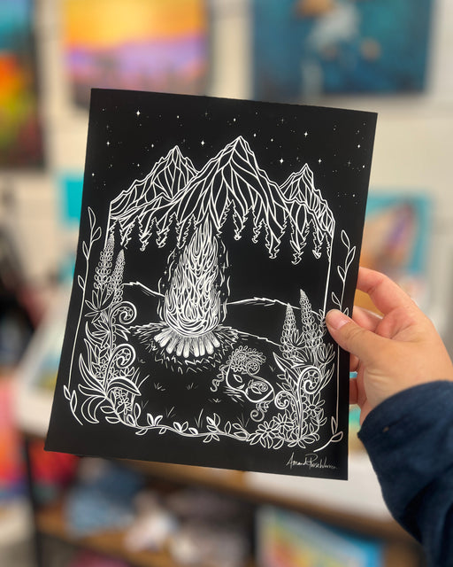 Small print of B&W Spring Equinox being held in someones hand