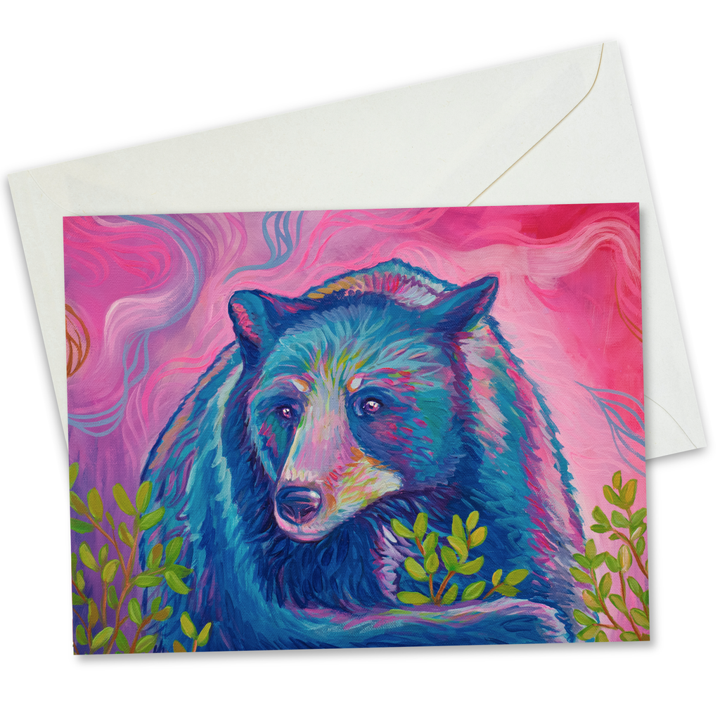 Painted blue and purple bear in a bush of leaves with a pink background and white envelope