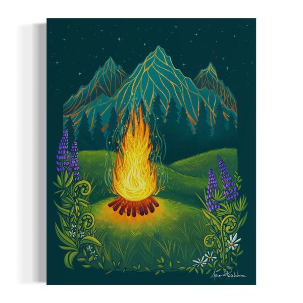 Fire in the summer time with lupine and foilage at night