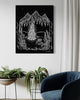 Plants and sofa, with an art print hanging on the wall