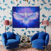 Geometrical blue and white wall in living room with blue chairs and pink lamps. Large White Raven Artwork hanging on wall