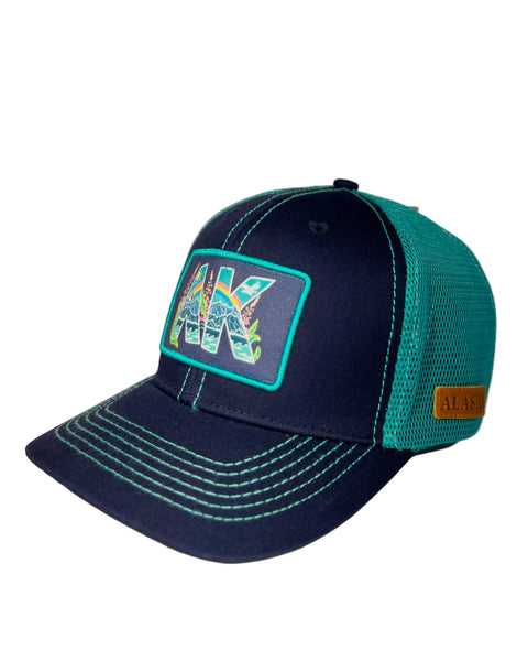 AK Vibin navy trucker hat featuring Alaska-inspired design, adjustable mesh cap with clean outdoor lifestyle style