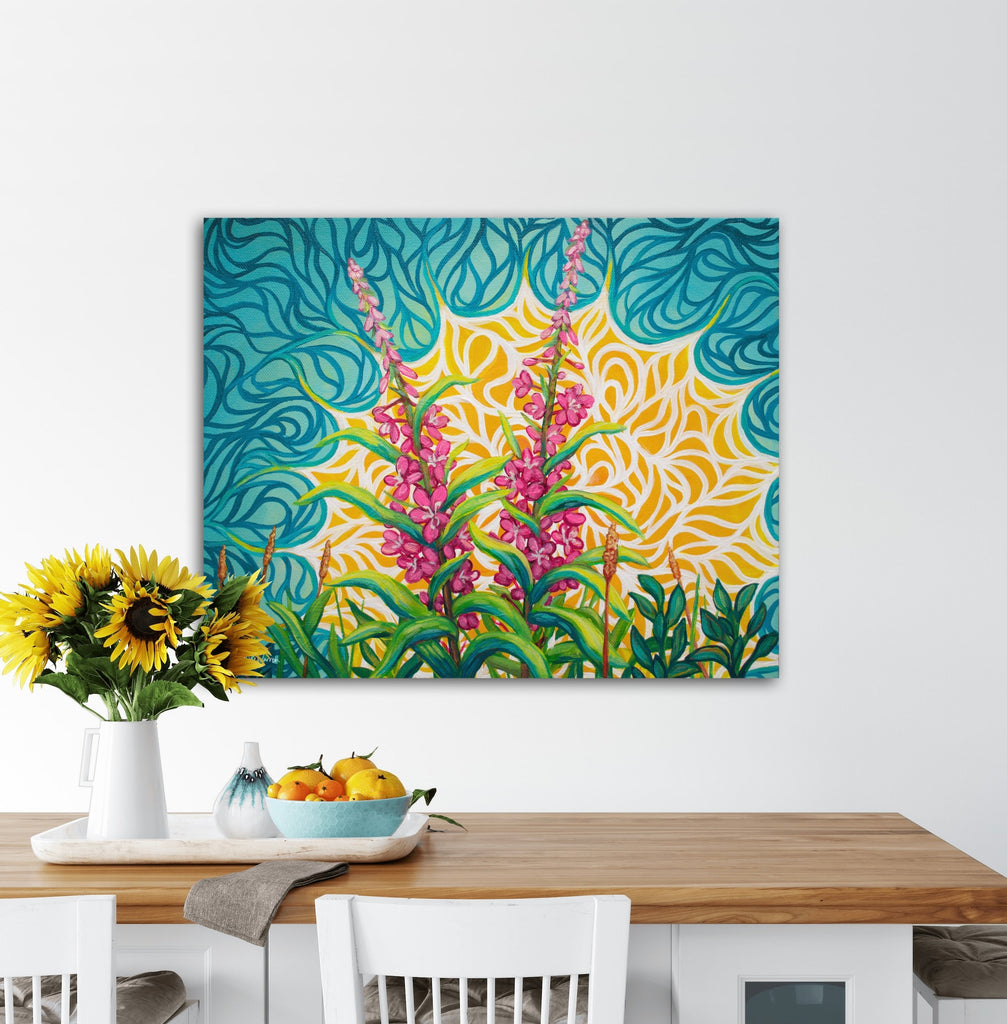 Colorful floral painting on a wall above a dining table with flowers and fruit.