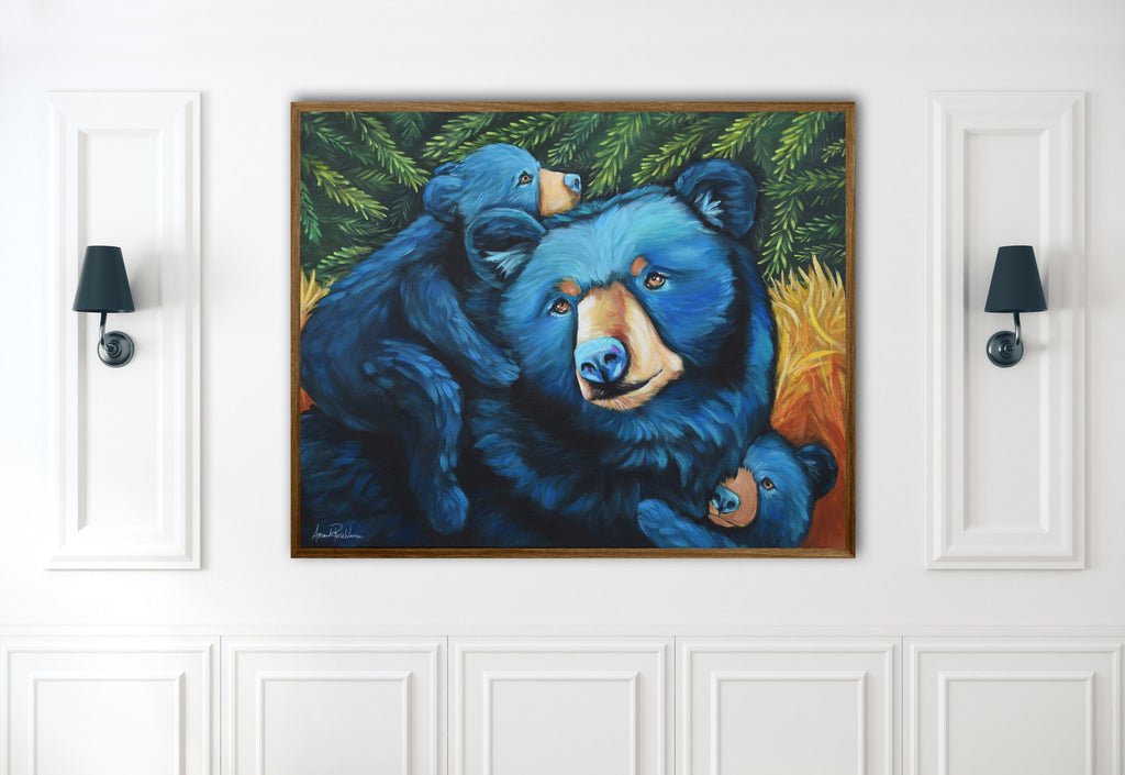 Framed painting of three blue bears on a white wall.