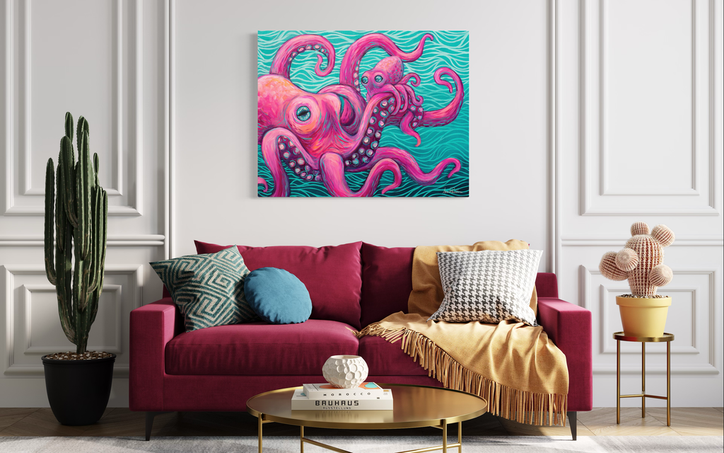 Living room with a pink couch, colorful octopus family painting, and decorative items.