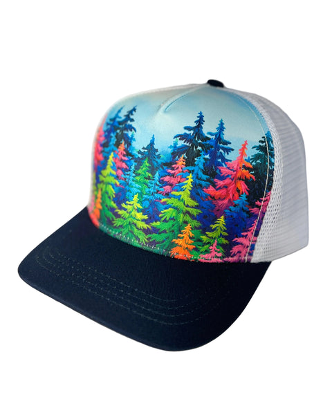 Mystic Trees navy trucker hat featuring Alaska-inspired rainbow forest design, adjustable mesh cap with vibrant artistic woodland style