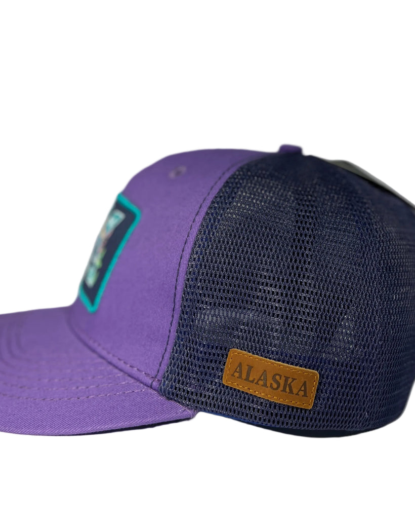 Purple AK Vibin trucker hat with Alaska-themed design, casual adjustable cap with vibrant outdoor lifestyle aesthetic