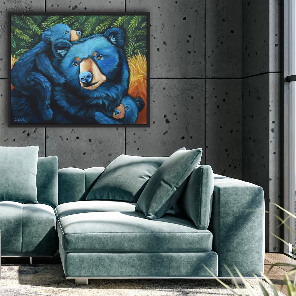 Gray sectional sofa with decorative pillows in a room with a bear painting on the wall.
