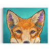 Colorful painting of a fox's face on a teal background