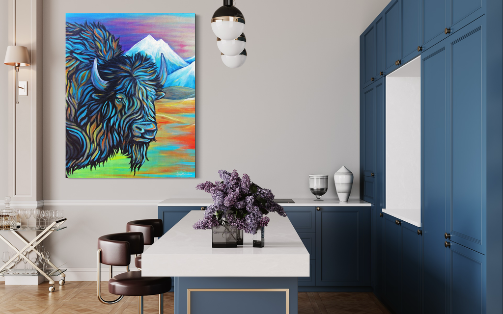 Modern kitchen with blue cabinets, white countertops, and a colorful abstract painting of a bison on the wall.