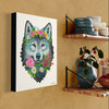Canvas print of a wolf with floral crown on a wall next to a shelf with kitchen items.